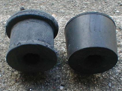 Finsihed bushing next to rubber stopper stock